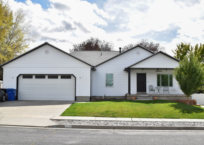Full-home siding replacement in Brigham City, Utah with white Ascend Composite Cladding