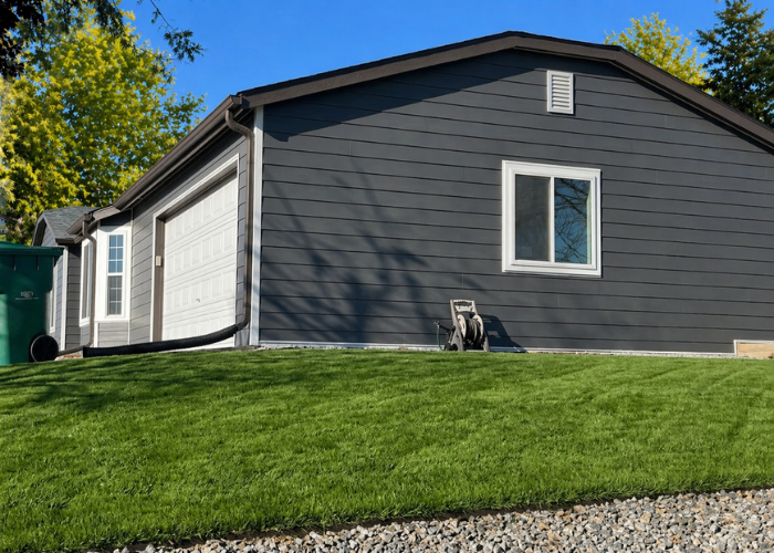 Side view of siding replacement in Layton Utah with Alside Ascend 7 inch Plank in Cast Iron
