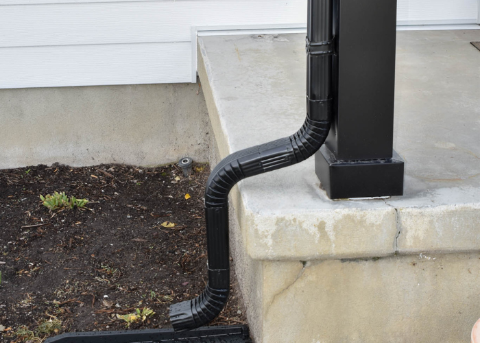 Black gutter detail on siding replacement project in Brigham City, Utah