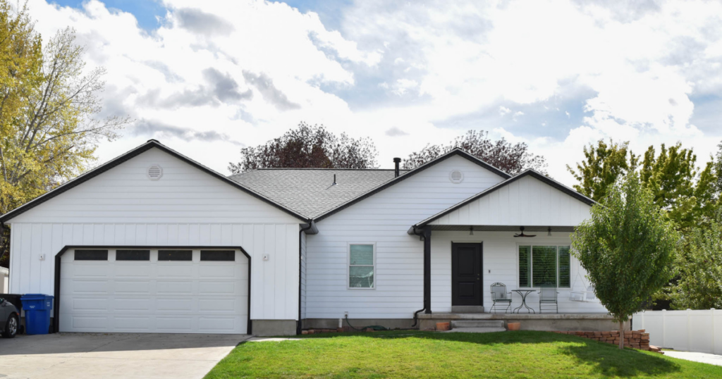 Siding contractors installing fiber cement on a Salt Lake County home