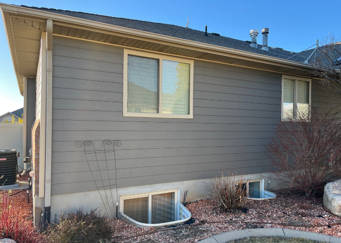 Side elevation detail of Layton Utah siding replacement with Ageless Slate Ascend Composite Cladding