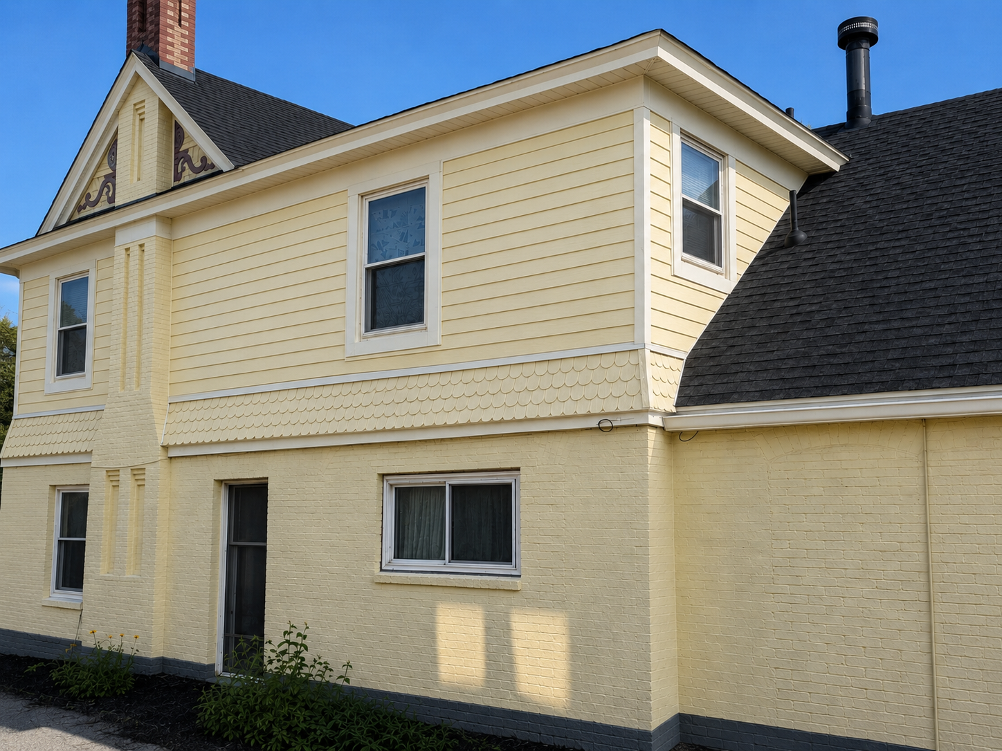 Back of house before view of Ogden, Utah home after siding replacement