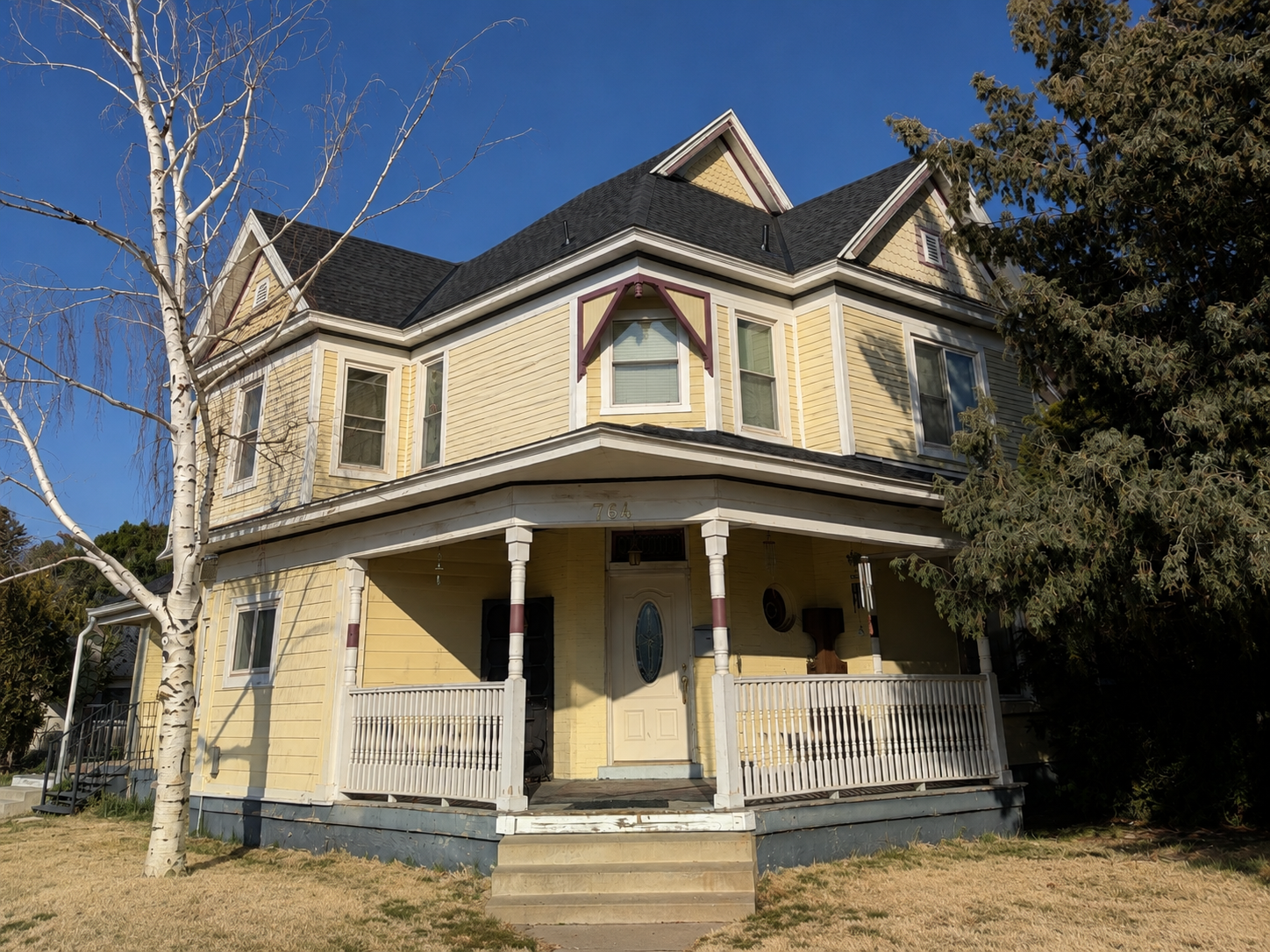 Before front view of Ogden, Utah home before siding replacement