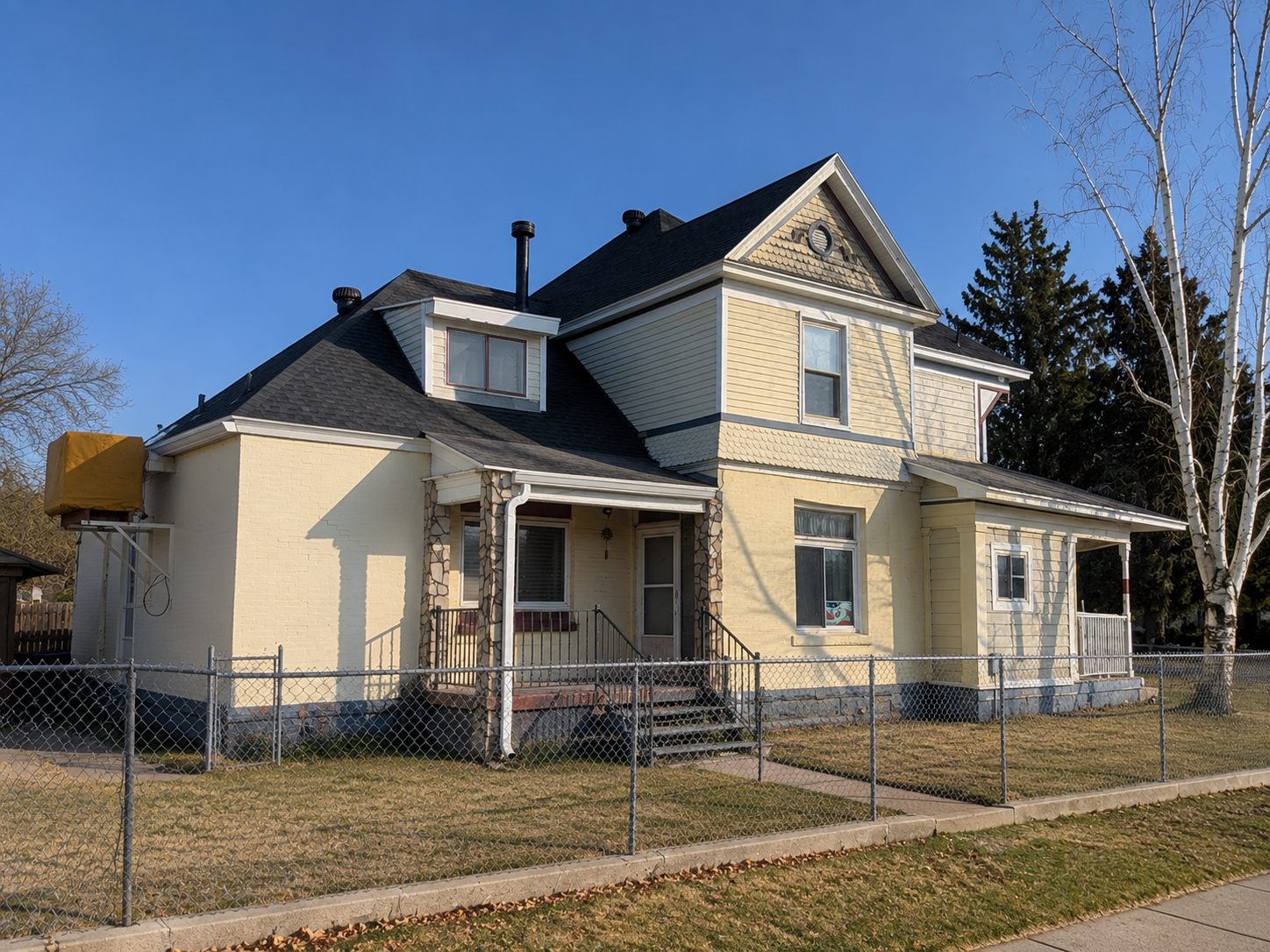 Before side view of Ogden, Utah home before siding replacement