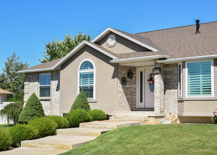 Second side view of front of house after window replacement in Clinton, Utah
