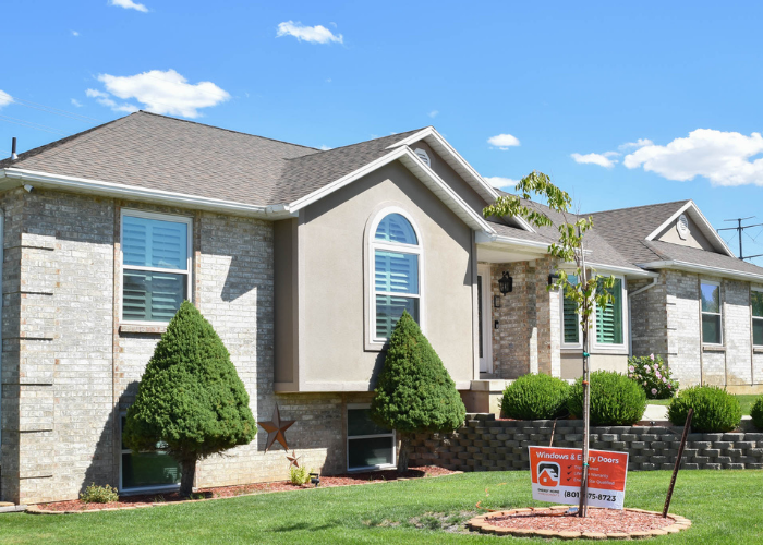 Side view of front of house after window replacement in Clinton, Utah