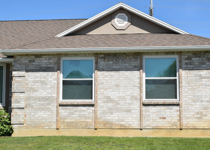 Side view of house after window replacement in Clinton, Utah