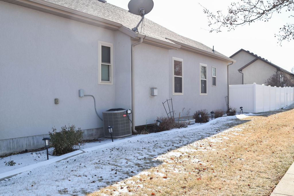 Side view of back of house window replacement in West Jordan, Utah