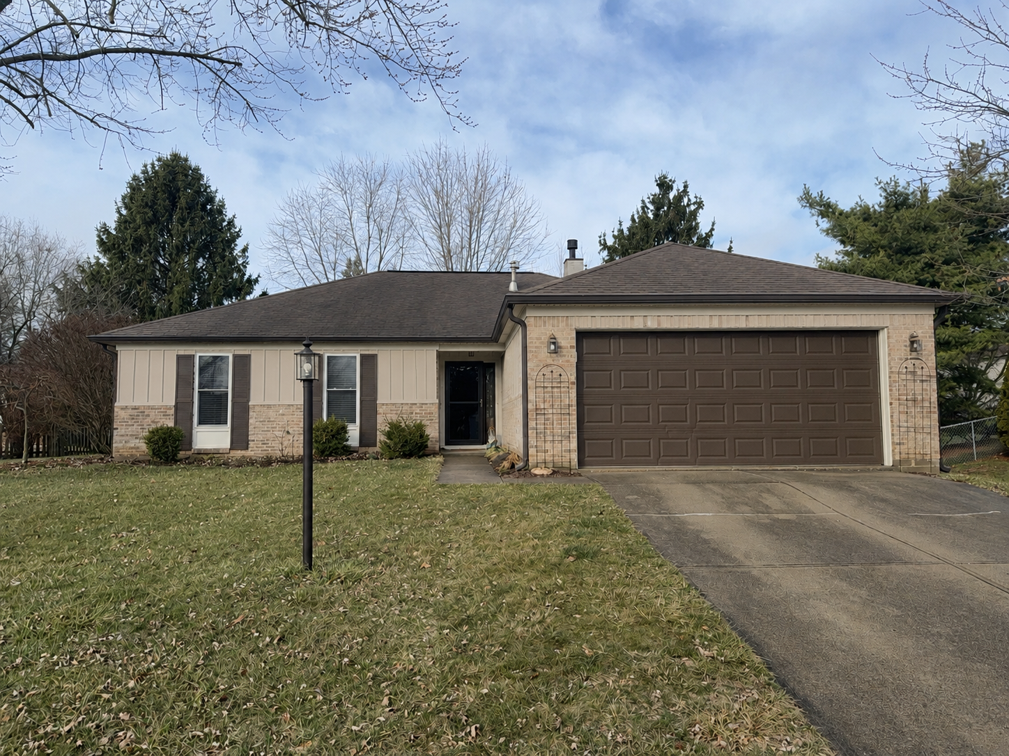 Front view after siding replacement in Fishers, Indiana with Monterey Sand Ascend Board and Batten