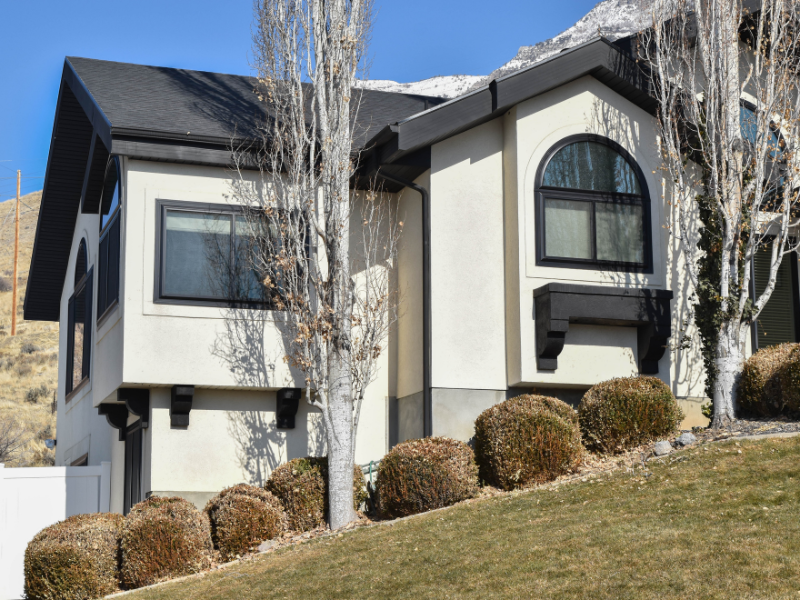Completed modern window replacement with slim black frames on Pleasant Grove Utah home exterior