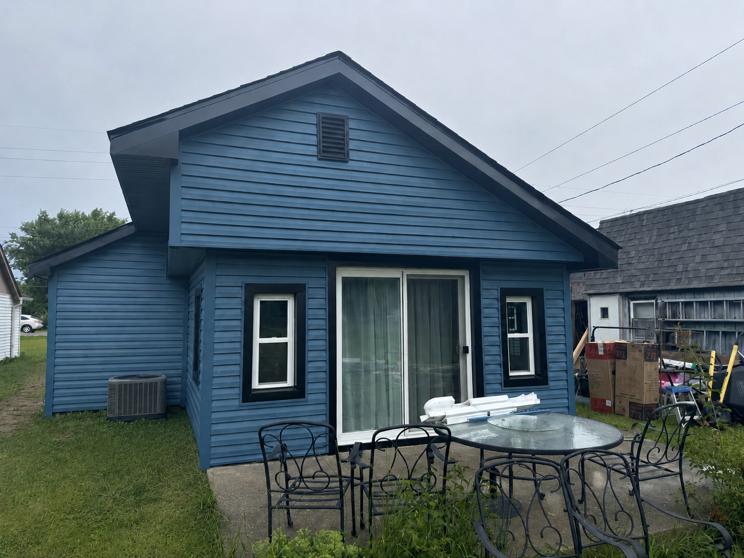 Back patio after Indianapolis siding replacement with Laguna Blue Dutch Lap siding