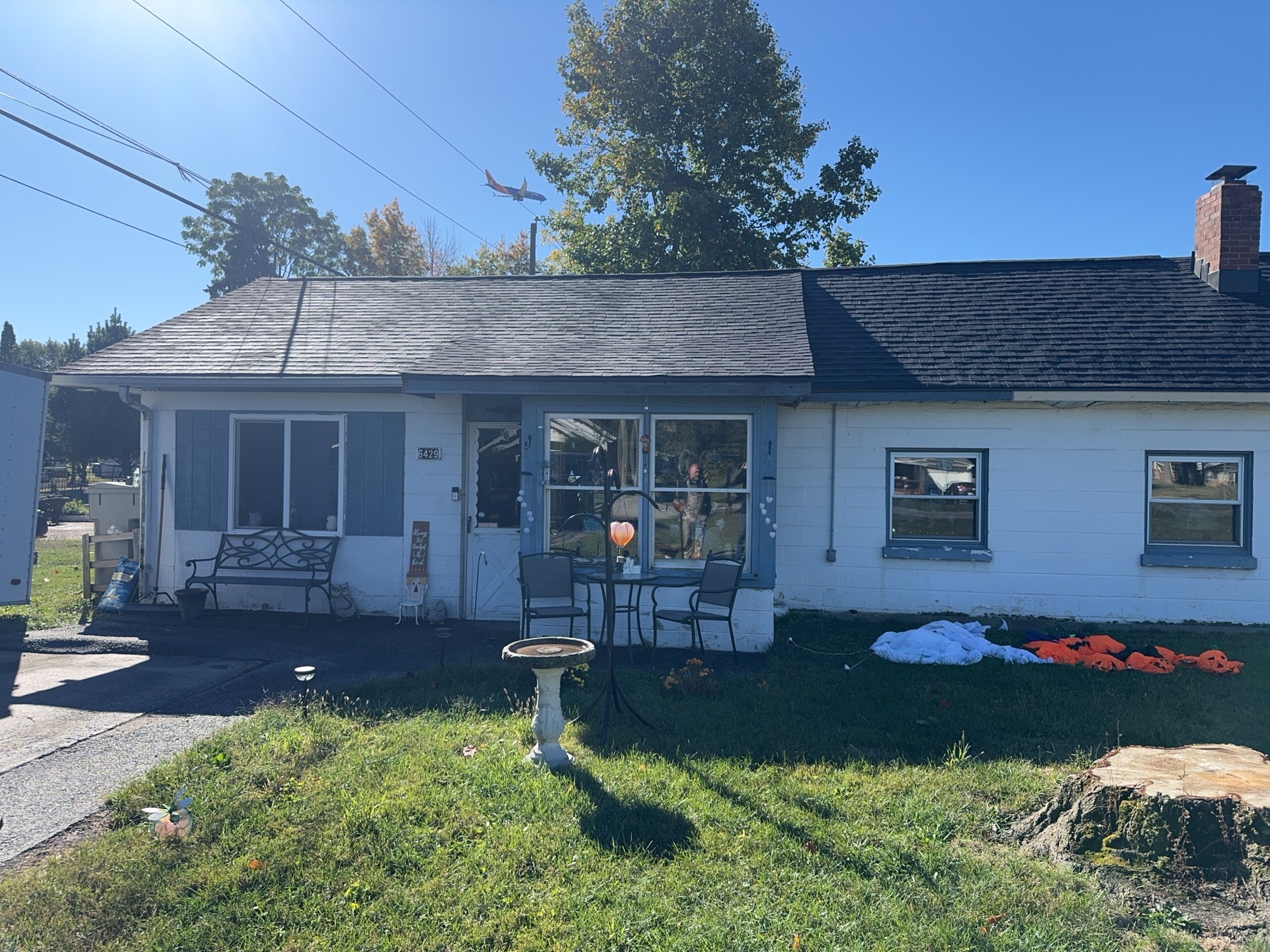 Before front exterior view of Indianapolis home before siding replacement